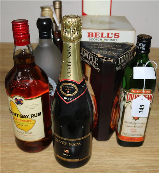 A Haig scotch whiskey dimple, Bells bell, champagne and six other various spirits
